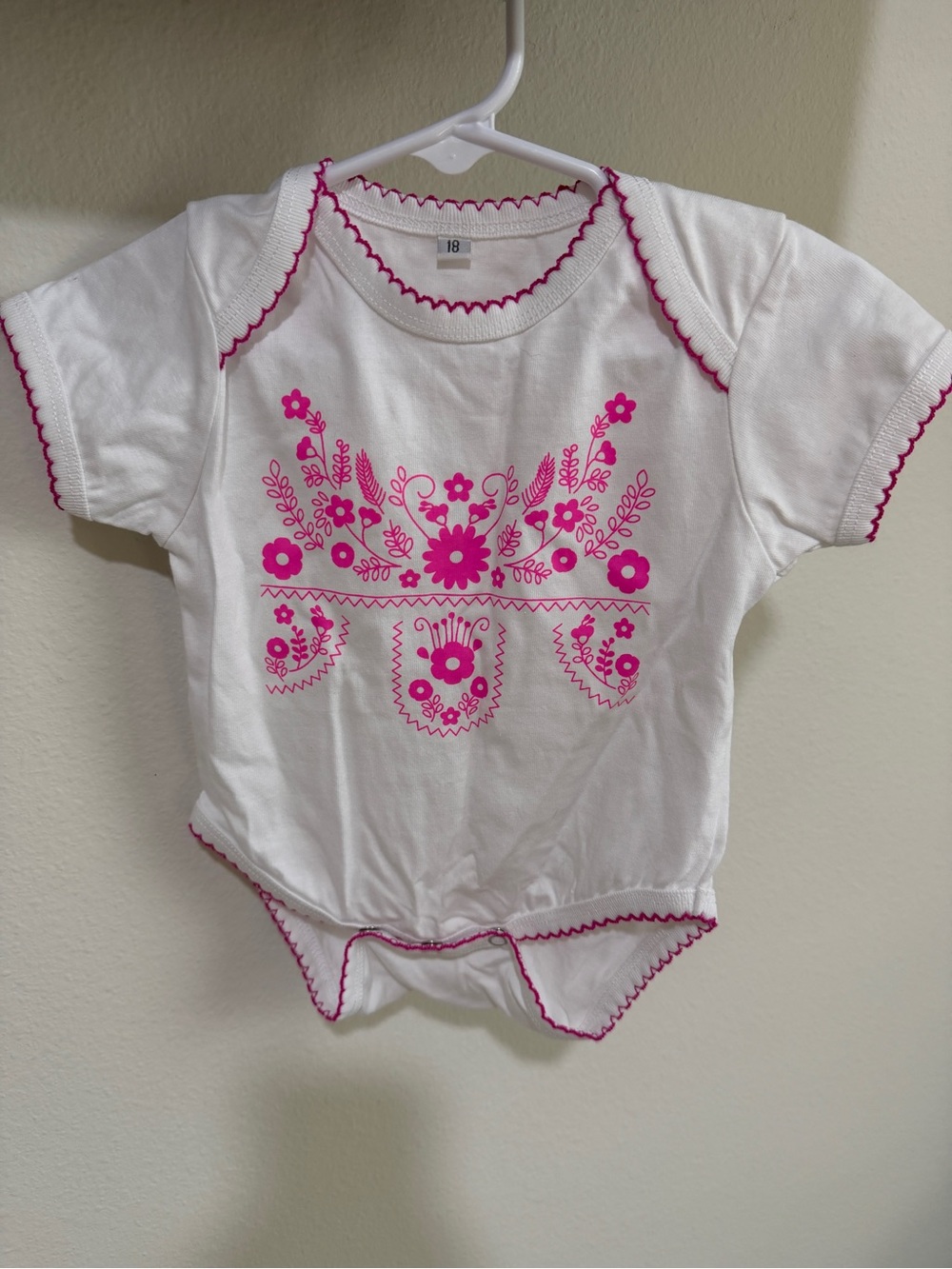 White Baby Fiesta Onesie with Hot Pink Floral Print